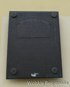 Tablica pamiątkowa na budynku Mennicy przy ul. Pereca